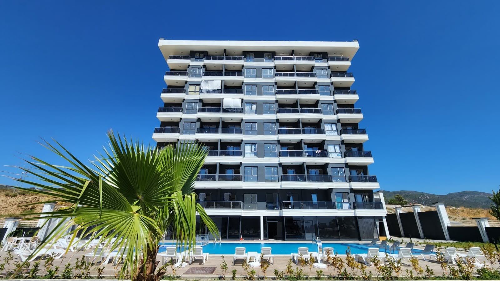 Недорогая квартира в Алании 1+1 в комплексе Milano Pearl в районе Демирташ - Фото 1