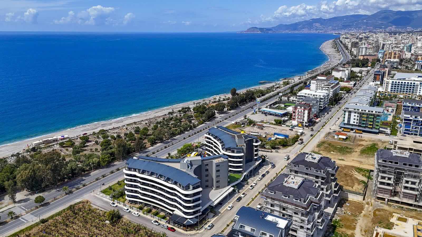 Квартира в Алании на первой линии 1+1 в премиум комплексе Via Mar в Алании - Фото 1