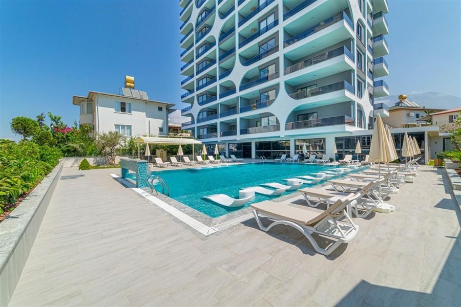 Просторная квартира в Махмутлар 1+1 в комплексе Cozy Residence в Алании - Фото 1