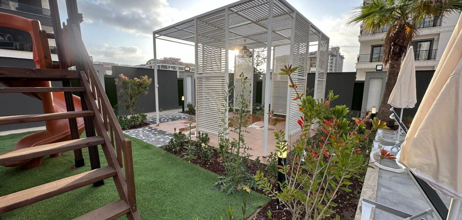 Квартира в Алании 2+1 в комплексе By Guzel 2000 в районе Махмутлар - Фото 3