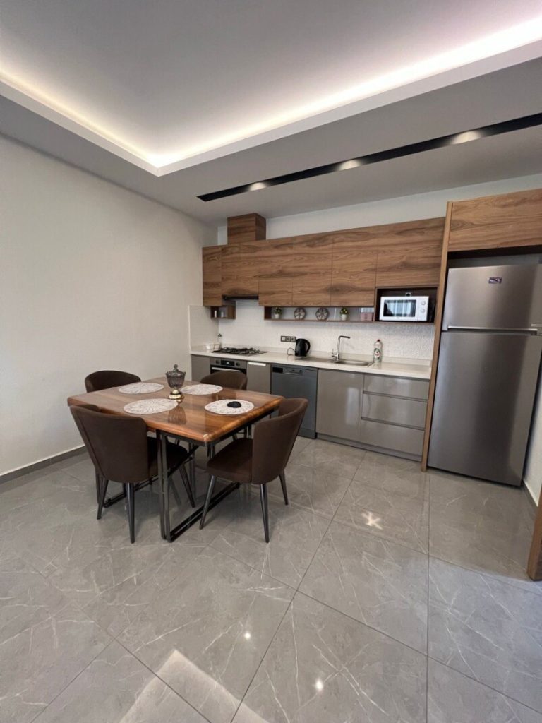Квартира в Алании 1+1 в комплексе Kurt Safir Euro 21 в районе Махмутлар - Фото 10