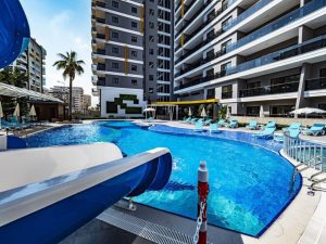 Квартира в Алании 1+1 в комплексе Kurt Safir Euro 21 в районе Махмутлар - Фото 1