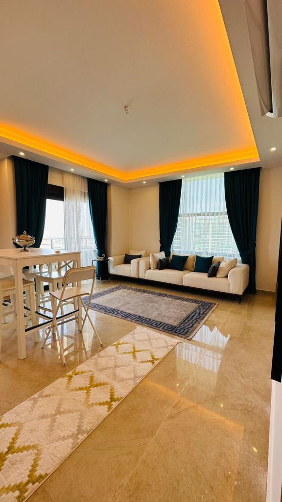 Недвижимость в Турции у моря 2+1 дуплекс в комплексе Albimo Loft в Махмутларе - Фото 12