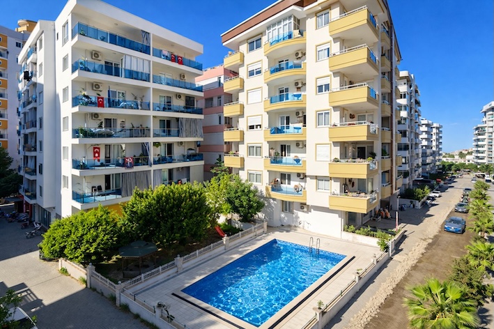 Квартира в Алании 3+1 дуплекс в Махмутлар Ferman Apt - Фото 1