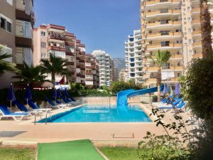 Квартира в Алании у моря 2+1 в комплексе Granada Residence в районе Махмутлар - Фото 2