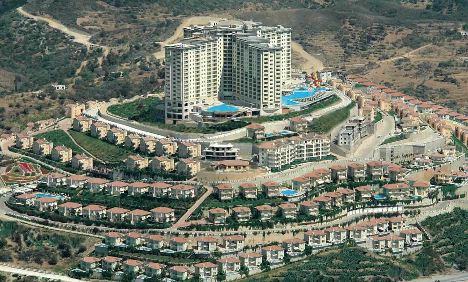 Квартира в Турции в комплексе Gold City в районе Каргыджак в Алании - Фото 1