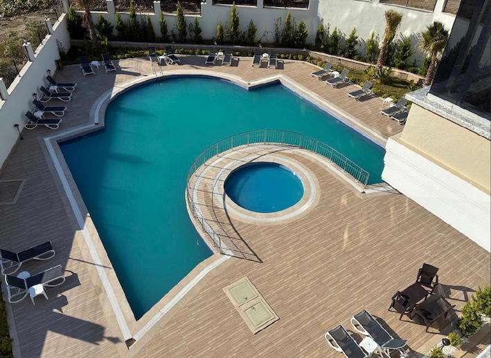 Недорогая квартира в Алании 1+1 в Махмутлар Travok - Фото 1