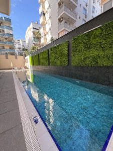Апартаменты в Махмутлар 2+1 в Kurt Safir Flower - Фото 3