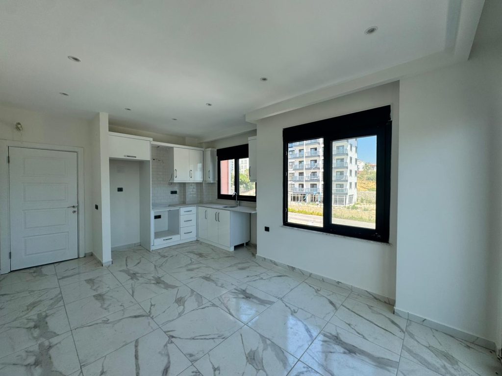 Купить квартиру в Алании 1+1 в Skyland Residence - Фото 8