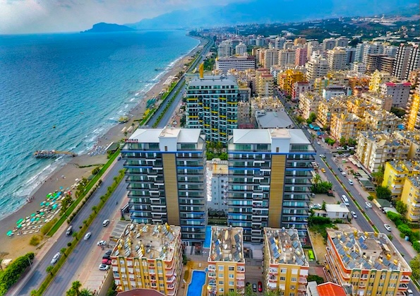 Купить квартиру в Турции на первой линии 2+1 в Konak Twin Tower - Фото 2
